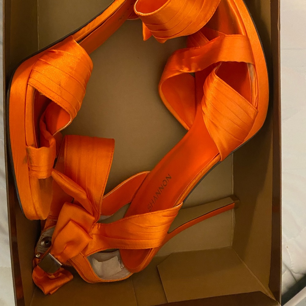 Michael Shannon size10 orange heeled sandals.